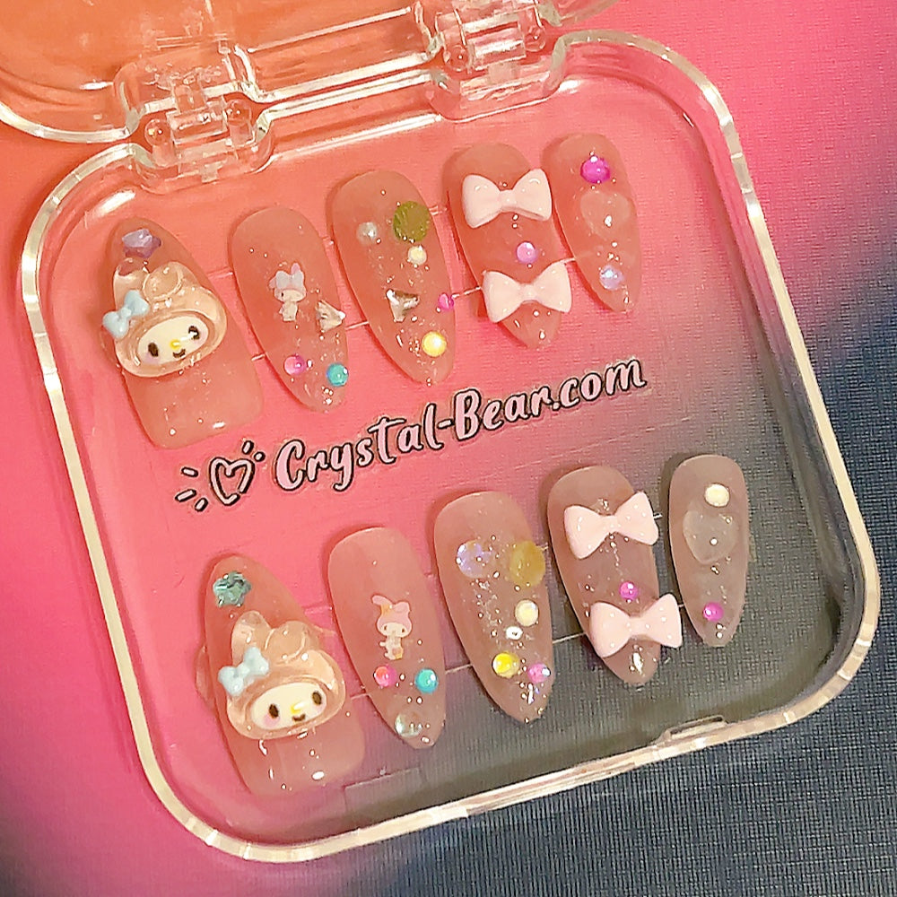 Pink almond short My Melody nails Theme: My Melody
Shape: Short Almond
Base Colors: Light Pink
Embellishments: My Melody charms, Bows, Colorful beads
Style: Cute, playful, and fun
Quality: High-quality, handmade craftsmanship