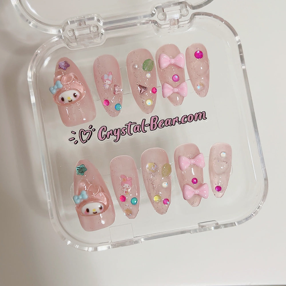 These cute nails are embellished with delightful My Melody charms and playful bows, making them perfect for any young fan. The addition of colorful beads adds a fun and vibrant touch that kids will love.