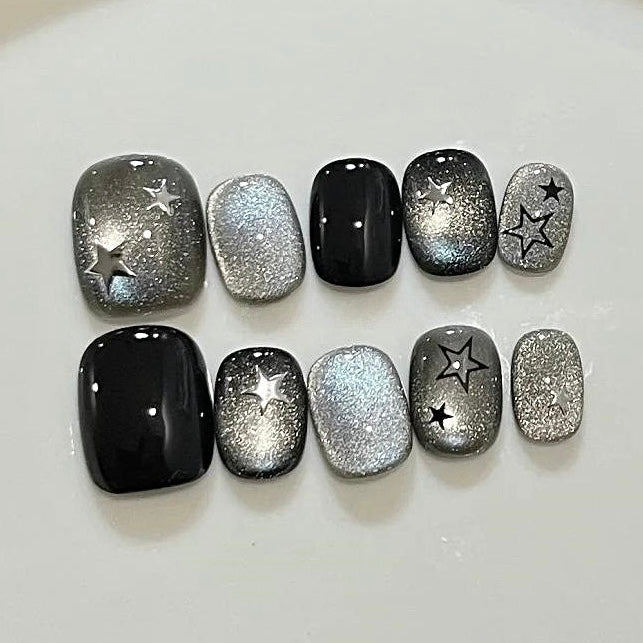 handmade short press on nails in a stunning black cat eye finish